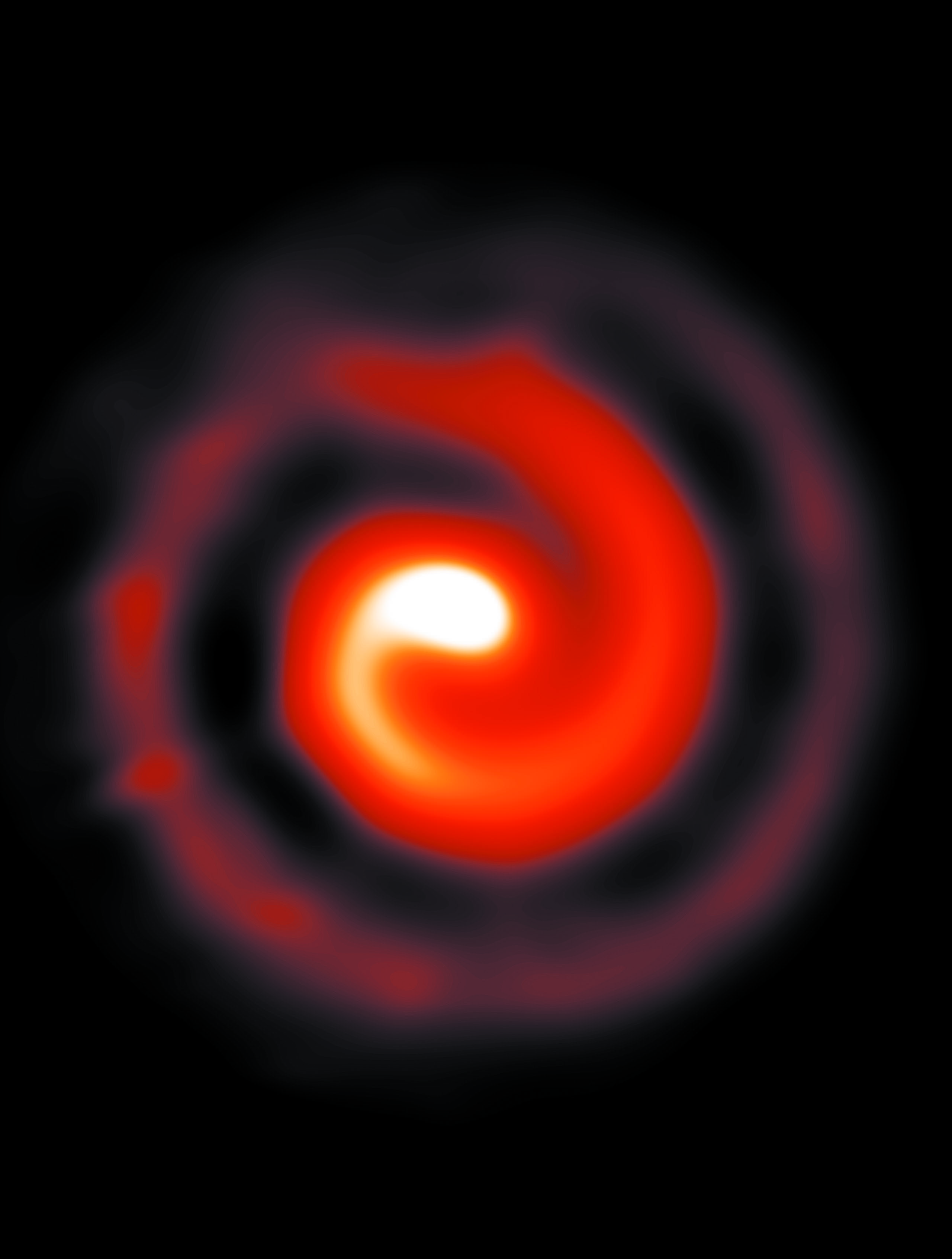 A spiral dust plume streams off the WR 104 binary-star system, as seen in infrared. (W. M. Keck Observatory/Peter Tuthill)